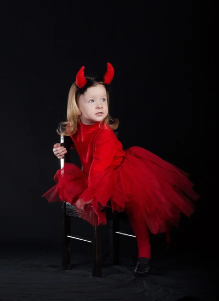 Little devil on dark background — Stock Photo, Image