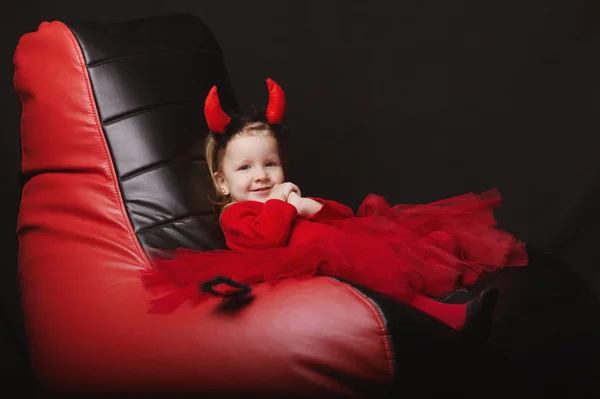 Little devil on dark background — Stock Photo, Image