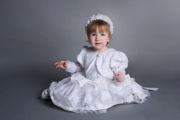 Little beautiful girl in wedding dress — Stock Photo, Image