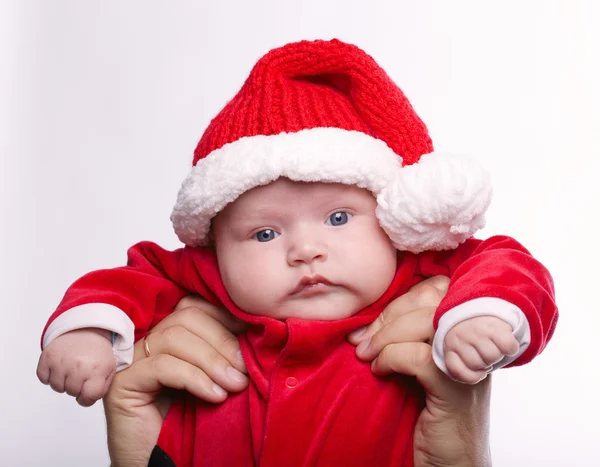 Niedliches Baby mit Weihnachtsmann-Kostüm — Stockfoto