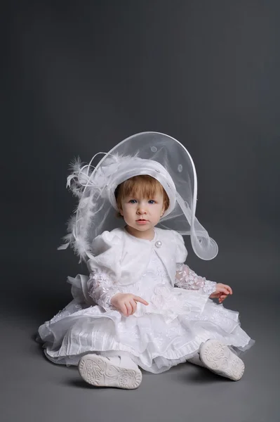 Little beautiful girl in wedding dress — Stock Photo, Image