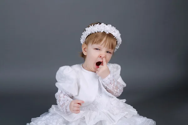 Little beautiful girl in wedding dress — Stock Photo, Image