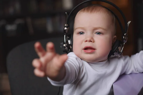 Little boy using headphones with mic — Stock Photo, Image