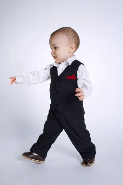 Cute little boy with suite — Stock Photo, Image