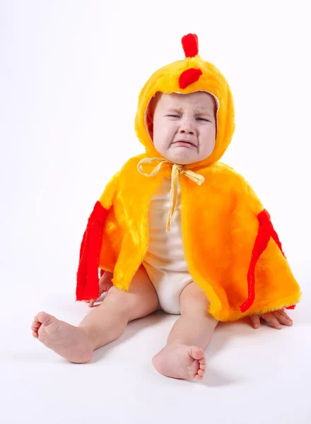 Little funny boy in chicken costume — Stock Photo, Image