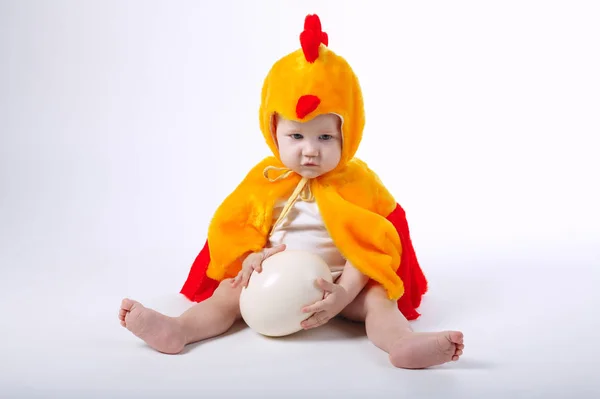 Little funny boy in chicken costume — Stock Photo, Image