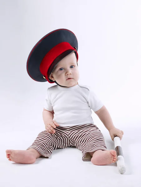 Polis şapkalı küçük komik çocuk — Stok fotoğraf