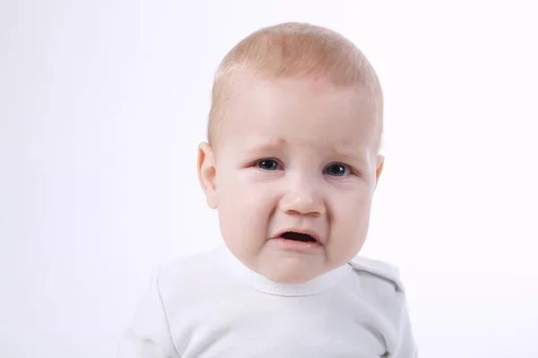 Bonito menino no fundo branco — Fotografia de Stock