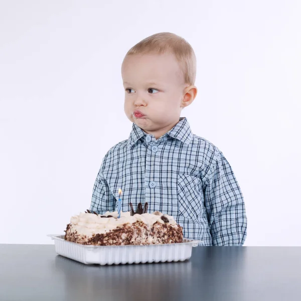 Cute little boy with birthday cake on white — Stock Photo, Image