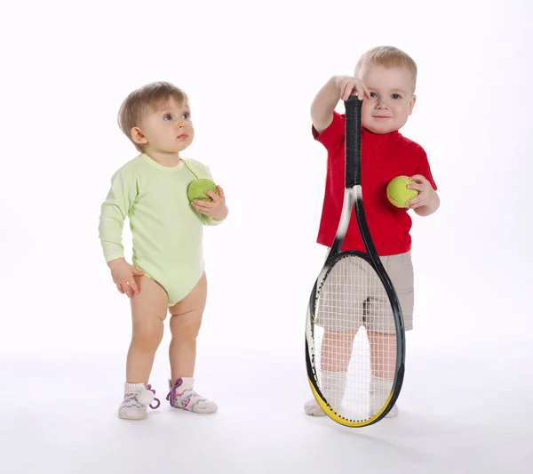 Divertido jugador de tenis sobre fondo blanco —  Fotos de Stock