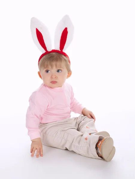 Cute little girl with rabbit ears — Stock Photo, Image