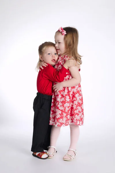 Lovely boy and girl on white — Stock Photo, Image