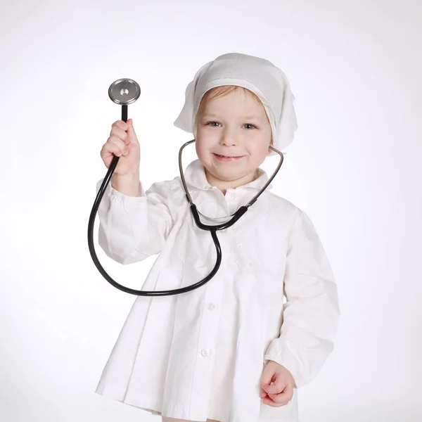 Cute little girl playing doctor — Stock Photo, Image