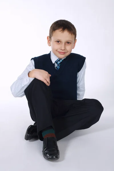 Young businessman on white — Stockfoto