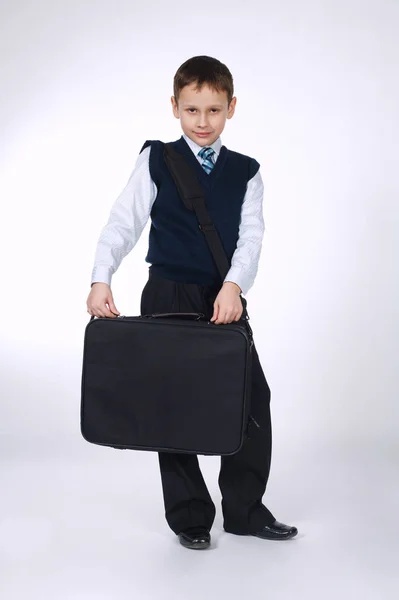 Funny boy with case on white — Stock Photo, Image