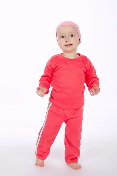 Menina fazendo exercício no fundo branco — Fotografia de Stock