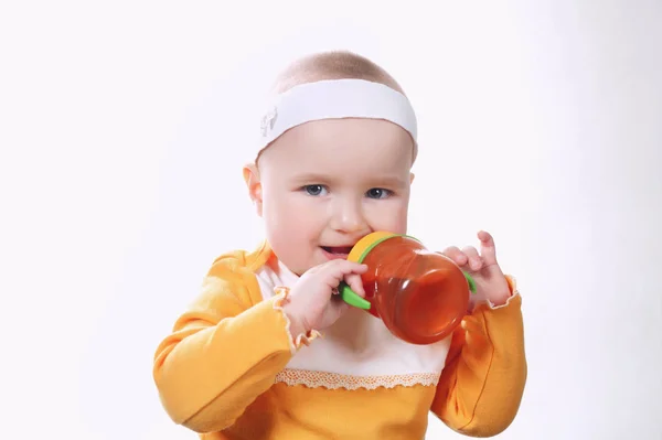 Portrait of pretty girl drinking juice — Stock Photo, Image