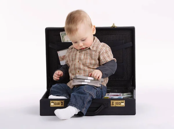 Young bookkeeper with suitcase of money — Stock Photo, Image