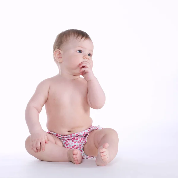 免震床に座って美しい赤ちゃん — ストック写真