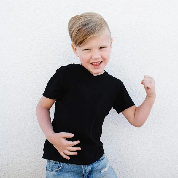 Young emotional boy on bright background — Stock Photo, Image