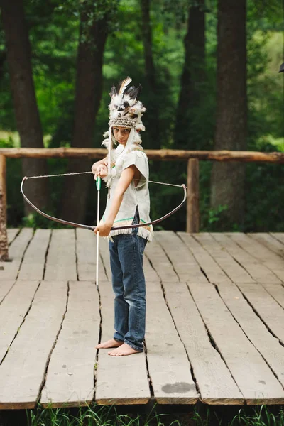 Little funny boy playing native american — Stock Photo, Image