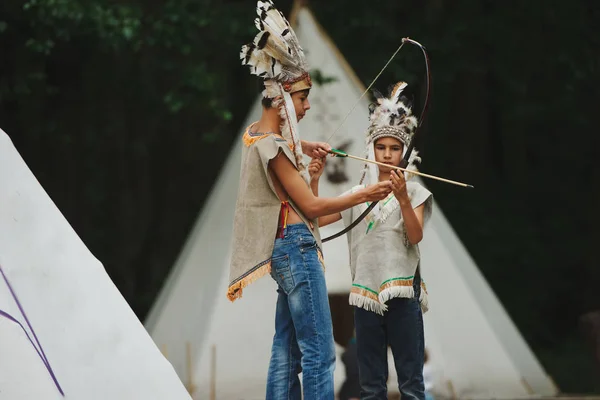 Happy children playing native american — Stock Photo, Image