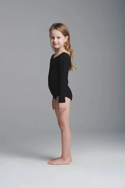 Little girl studio portrait on grey background — Stock Photo, Image