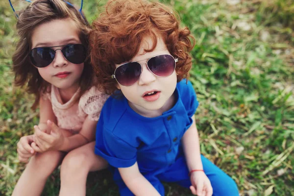 Cute stylish children in summer park — Stock Photo, Image