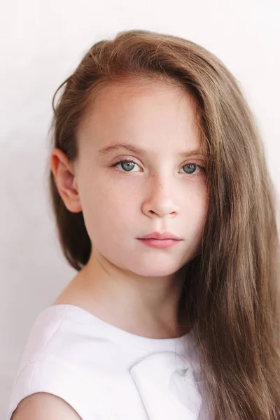 Beautiful young girl with long hair — Stock Photo, Image