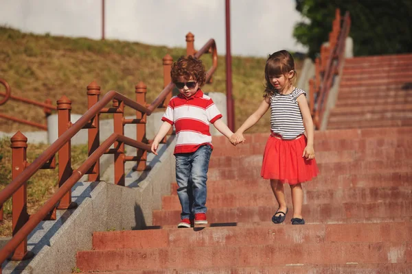 Little boy and girl on stairway — Stock Photo, Image