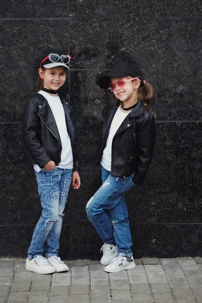 Stylish funny little girls on the street — Stock Photo, Image