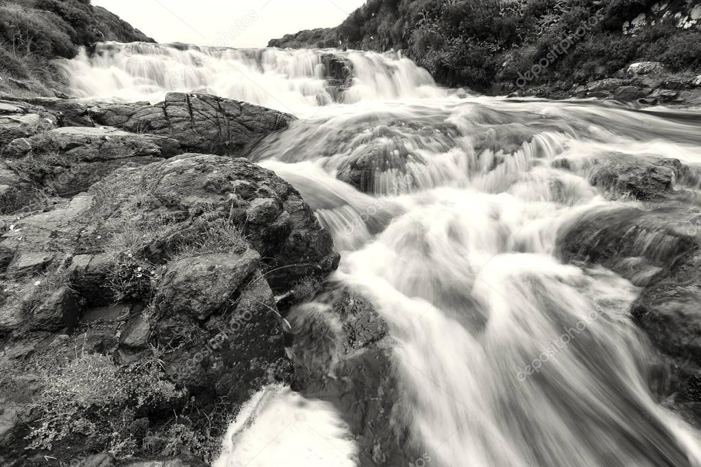 Waterfall at the Hermitage bridge on rainy day