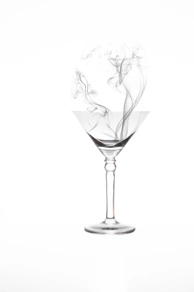 Martini glass with artificial smoke in it isolated on white back — Stock Photo, Image