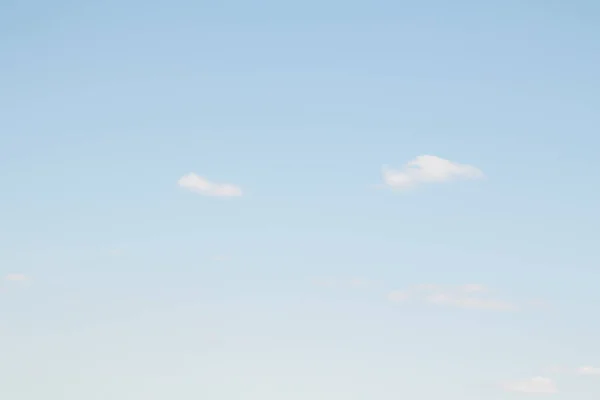Blue sky with white clouds. Clear summer day. Perfect desktop wallpaper.