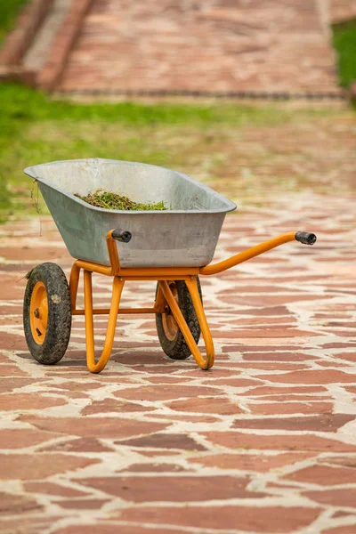 Wheelbarrow Yellow Trolley Construction Using Feathers Stones Sand Cement Others — Stock Photo, Image