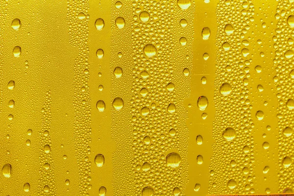 Drops Water Glass Yellow Background Beer Misted Background — Stock Photo, Image