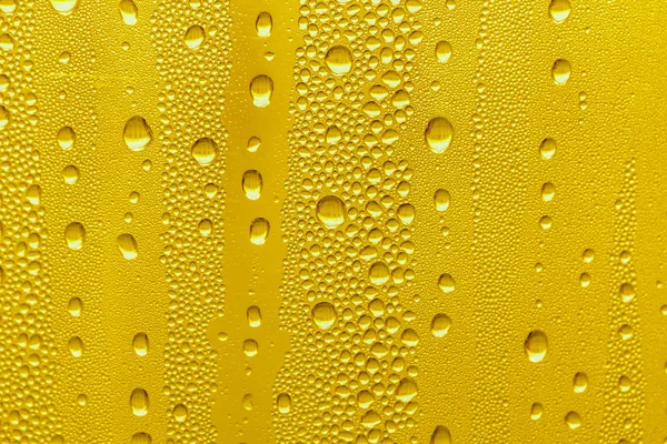 Drops Water Glass Yellow Background Beer Misted Background — Stock Photo, Image