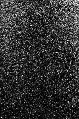 Su sıçramaları, beyaz bokeh, karanlık bir arka planda odak dışında bulanık arka plan.