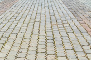 Yol dokusu, beton kaldırım taş gri arka plan. Mesafeye perspektif.