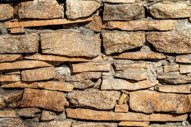 Düz granit taşlardan yapılmış duvarların dokusu, taş zemin..
