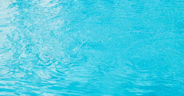 Fundo Superfície Água Água Piscina Azul Com Reflexos Solares Ondulações — Fotografia de Stock