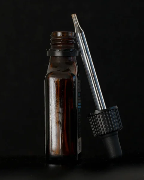 Glass Bottle Dropper Isolated Black Background — Stock Photo, Image