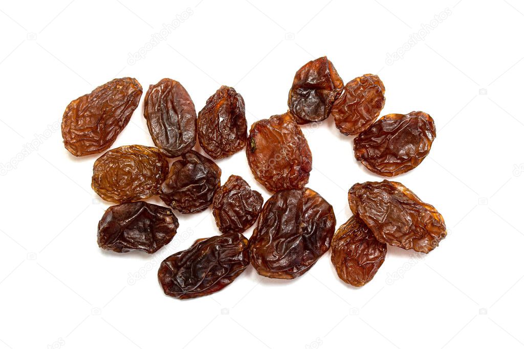 Dry grapes, raisins on a white background.
