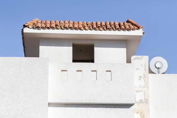 Buildings in the Middle East, Arab homes, white stucco. Against the blue sky, hot summer.