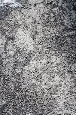 Kışın kardaki eski asfaltın arka planı, yol dokusu.