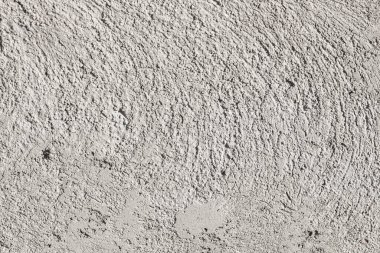 Pürüzlü doku, beton duvar, gri zemin.