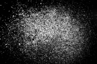 Siyah arka planda beyaz küller. Siyah arkaplanda beyaz toz soyut.