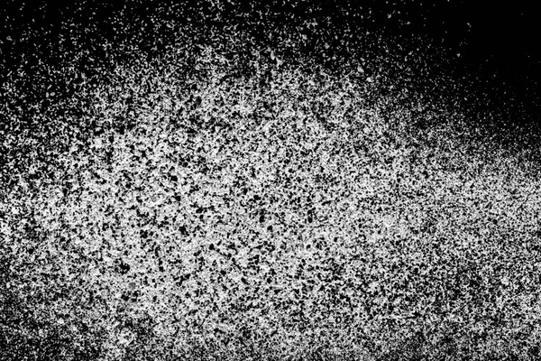 White ashes on a black background. White powder on black background abstract.