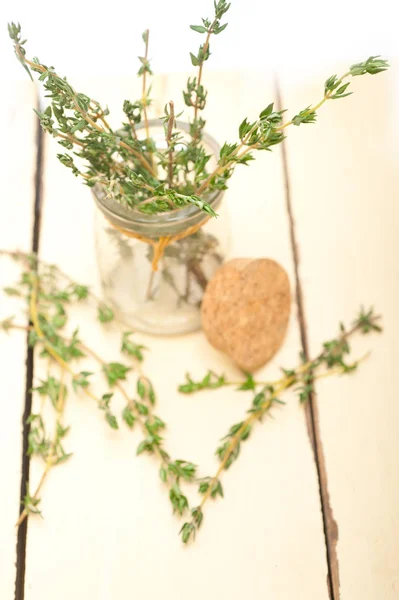 Fresh thyme on a glass jar — Stock Photo, Image