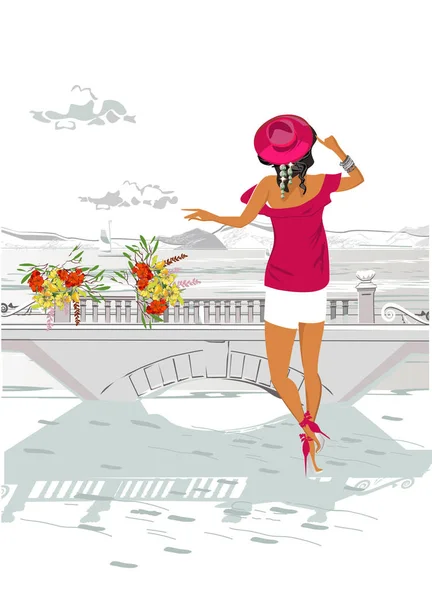 Hermosa mujer en un sombrero rojo en la ciudad vieja cerca del mar . — Archivo Imágenes Vectoriales